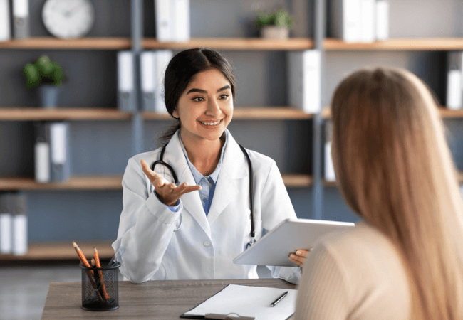 Lady Doctor with Patient